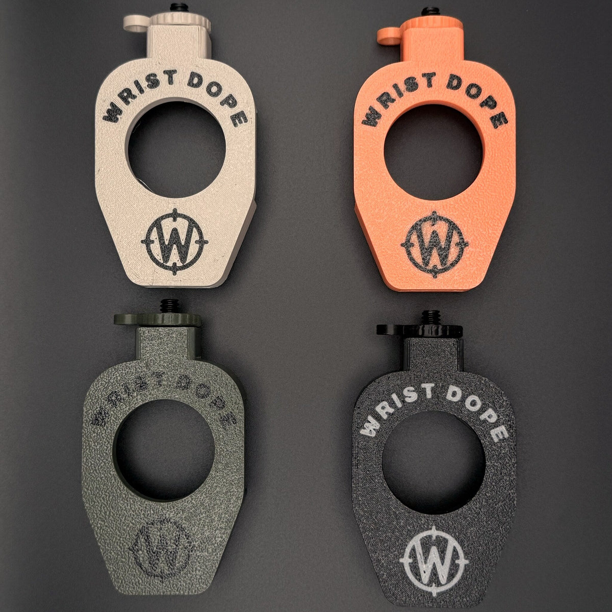Data Holder Watch Mount+ in all four colors, back, showing the 1/4-20 attachment point