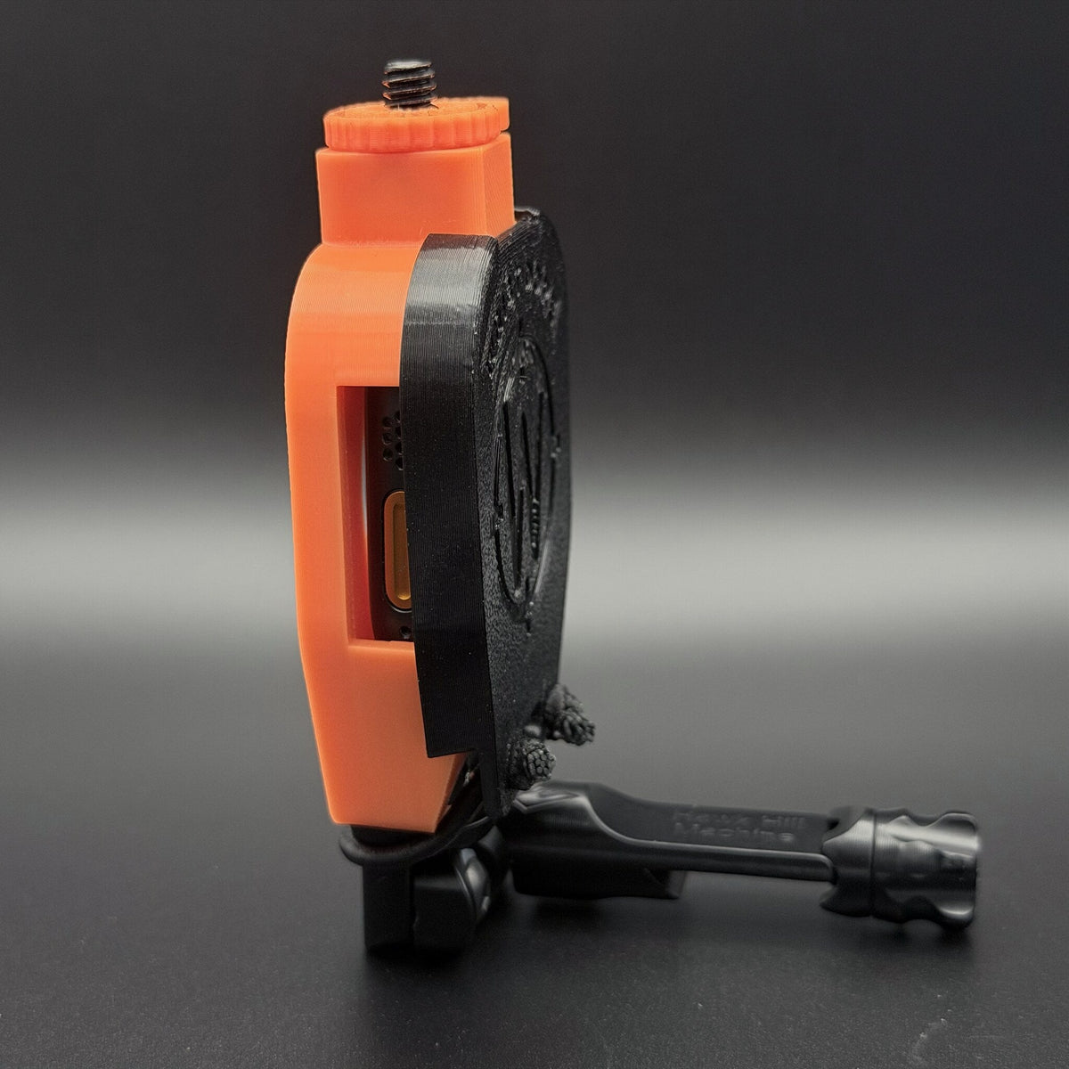Cover fitted over a Data Holder Watch Mount+ on a Hawk Hill holder, side view