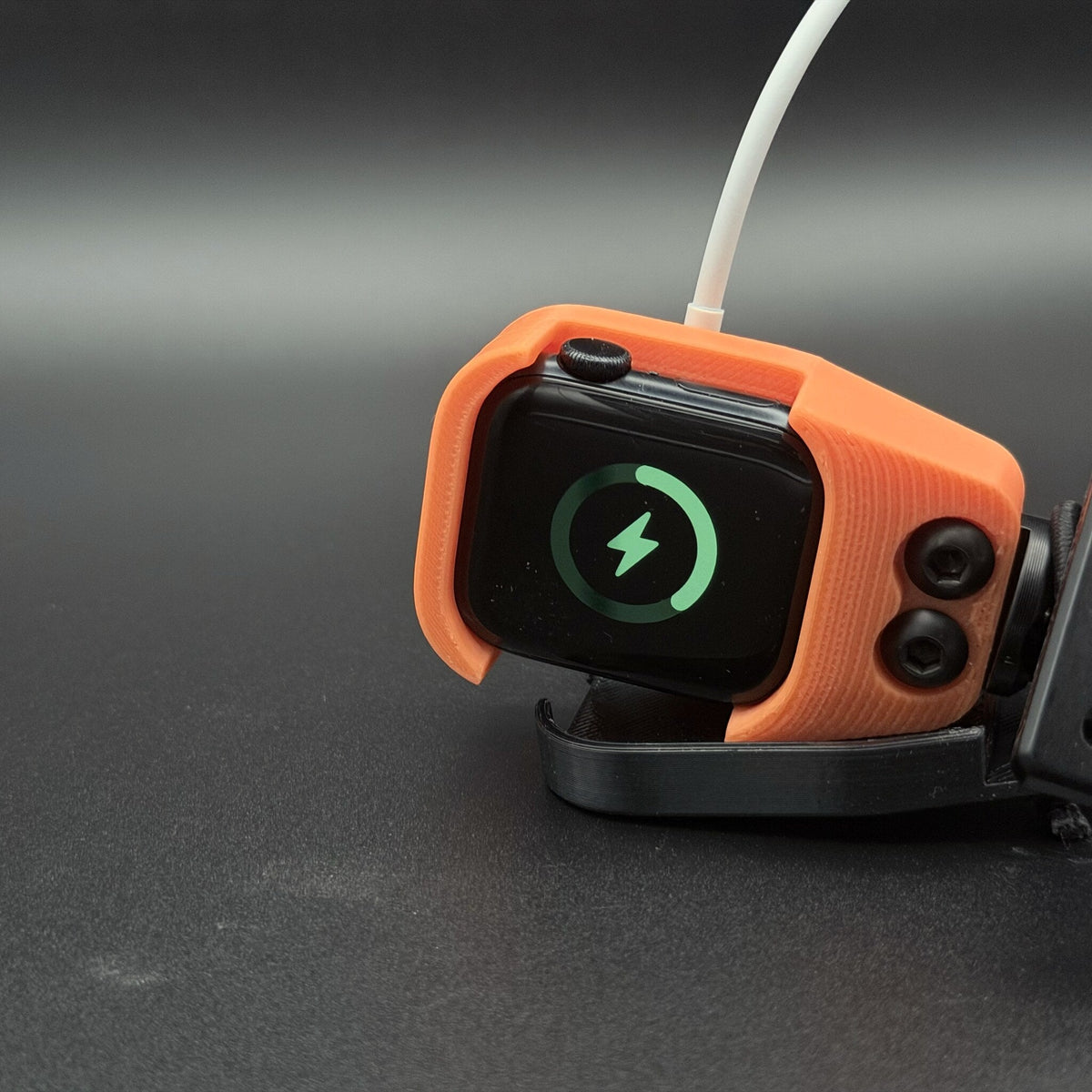 Apple Watch charging while seated in the watch mount