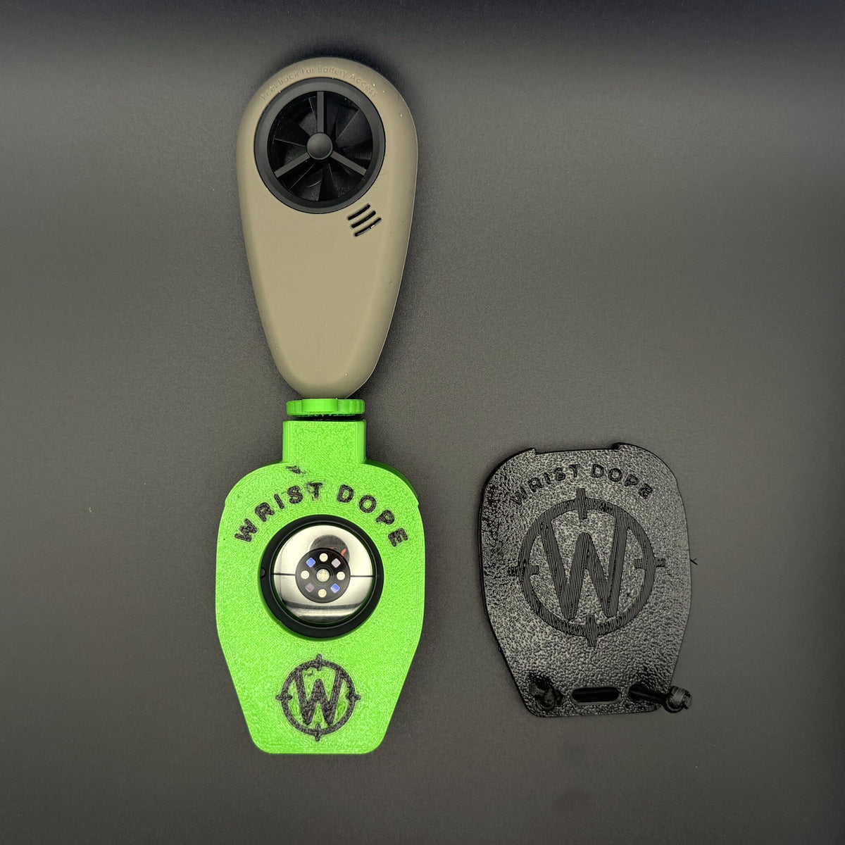 Lime Green Data Holder Watch Mount+ carrying a wind meter, back, beside its cover