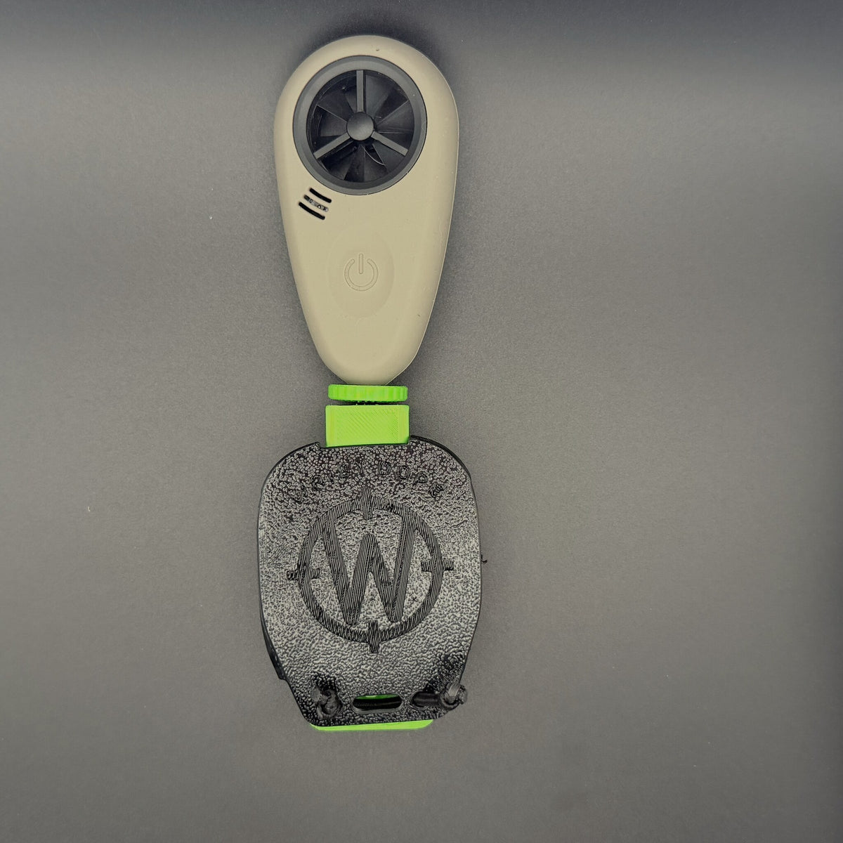 Cover fitted over a Lime Green Data Holder Watch Mount+ carrying a wind meter