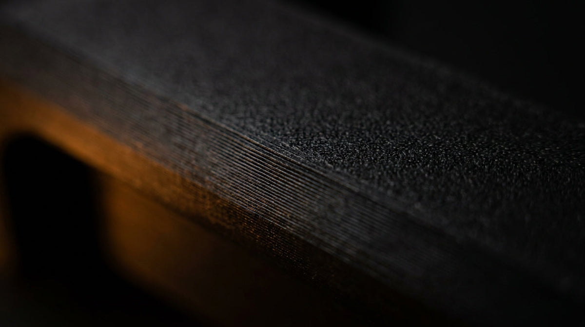 Dark textured background with an amber glow
